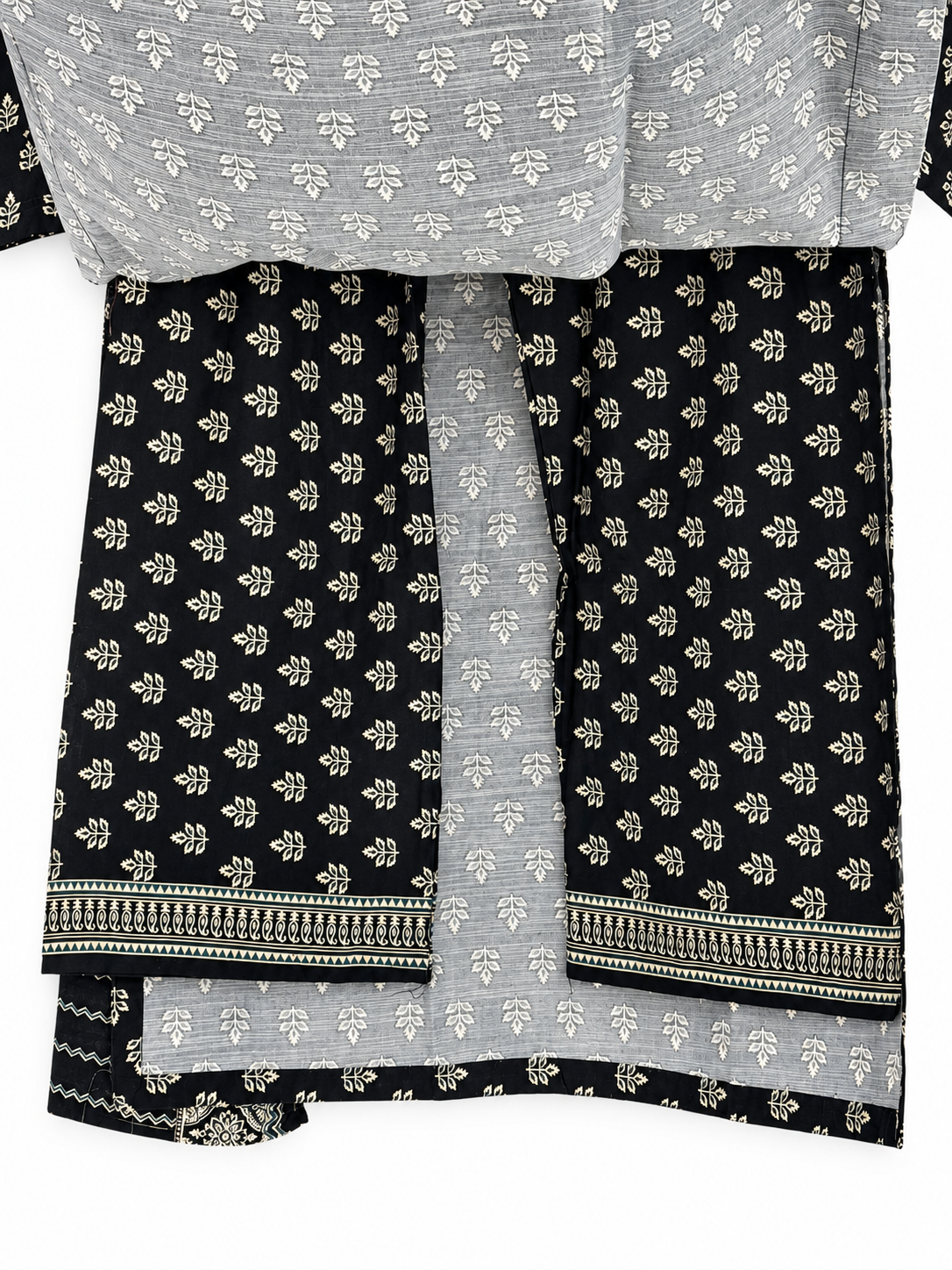 Black and ivory botanical print suit back and hem detail