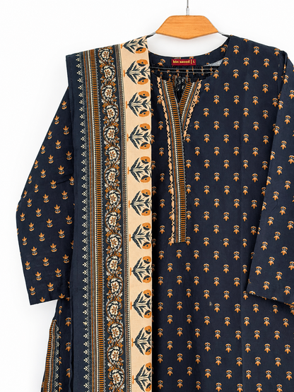 Navy mustard suit neckline and shawl detail