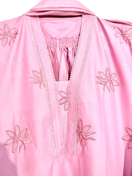 Pink garment with floral embroidery on a white background