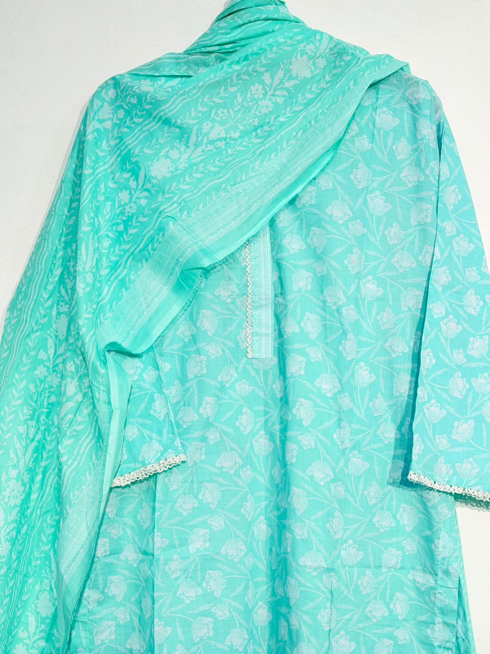 Mint green dupatta with self-woven border detail