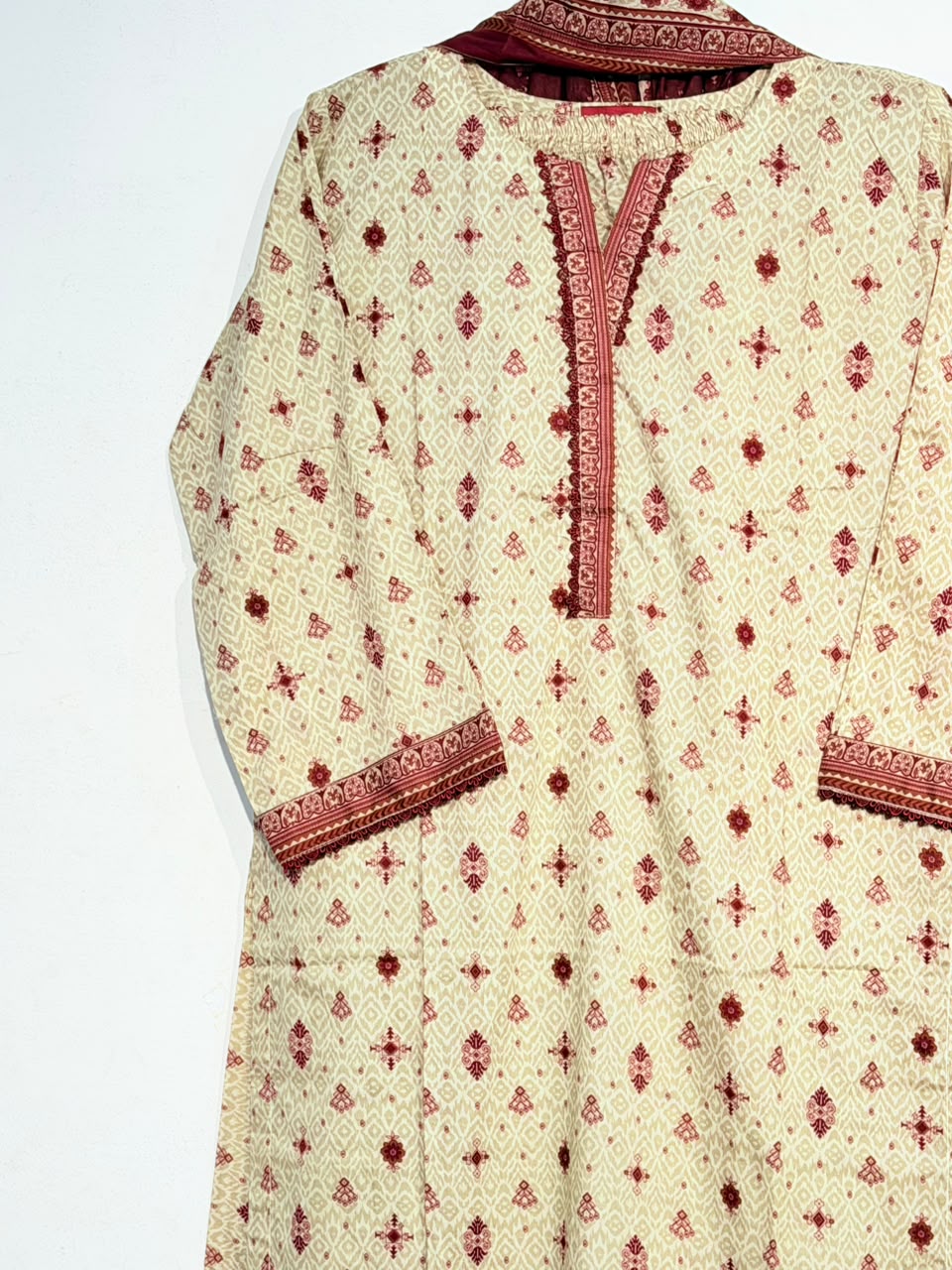 Cream maroon lawn suit neckline and cuff detail