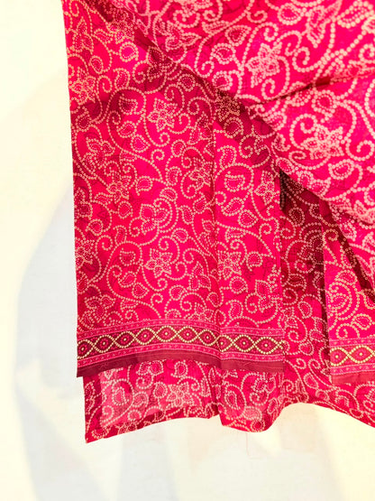 Bandhani print fabric close-up with border detail
