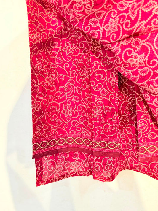Bandhani print fabric close-up with border detail