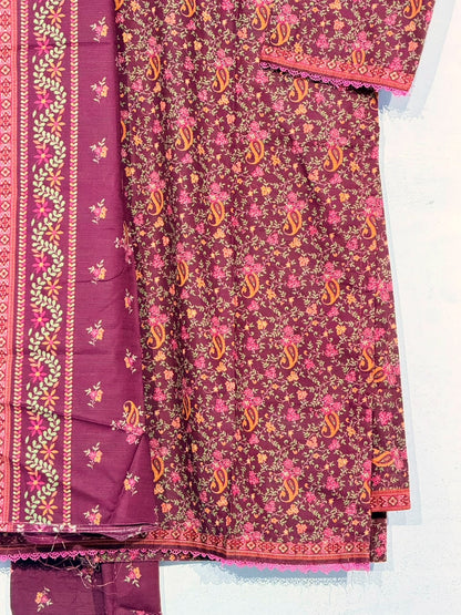 Polished close-up of the original maroon floral fabric, dupatta and border