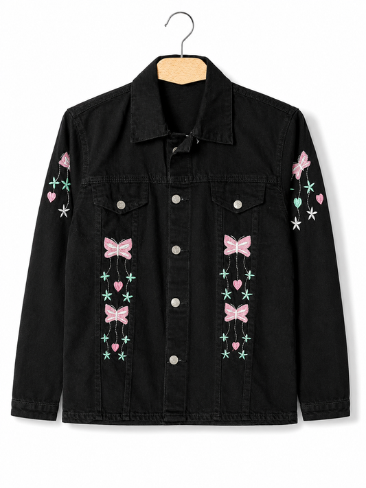 Women's black denim jacket with pink bow and heart embroidery – clean front view