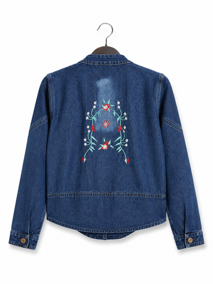 Women's blue denim jacket with red floral embroidery – clean back view